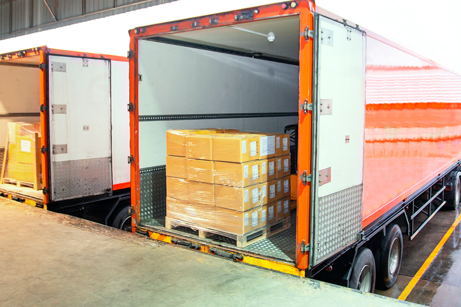 Less-Than-Truckload truck being loaded with different pallets